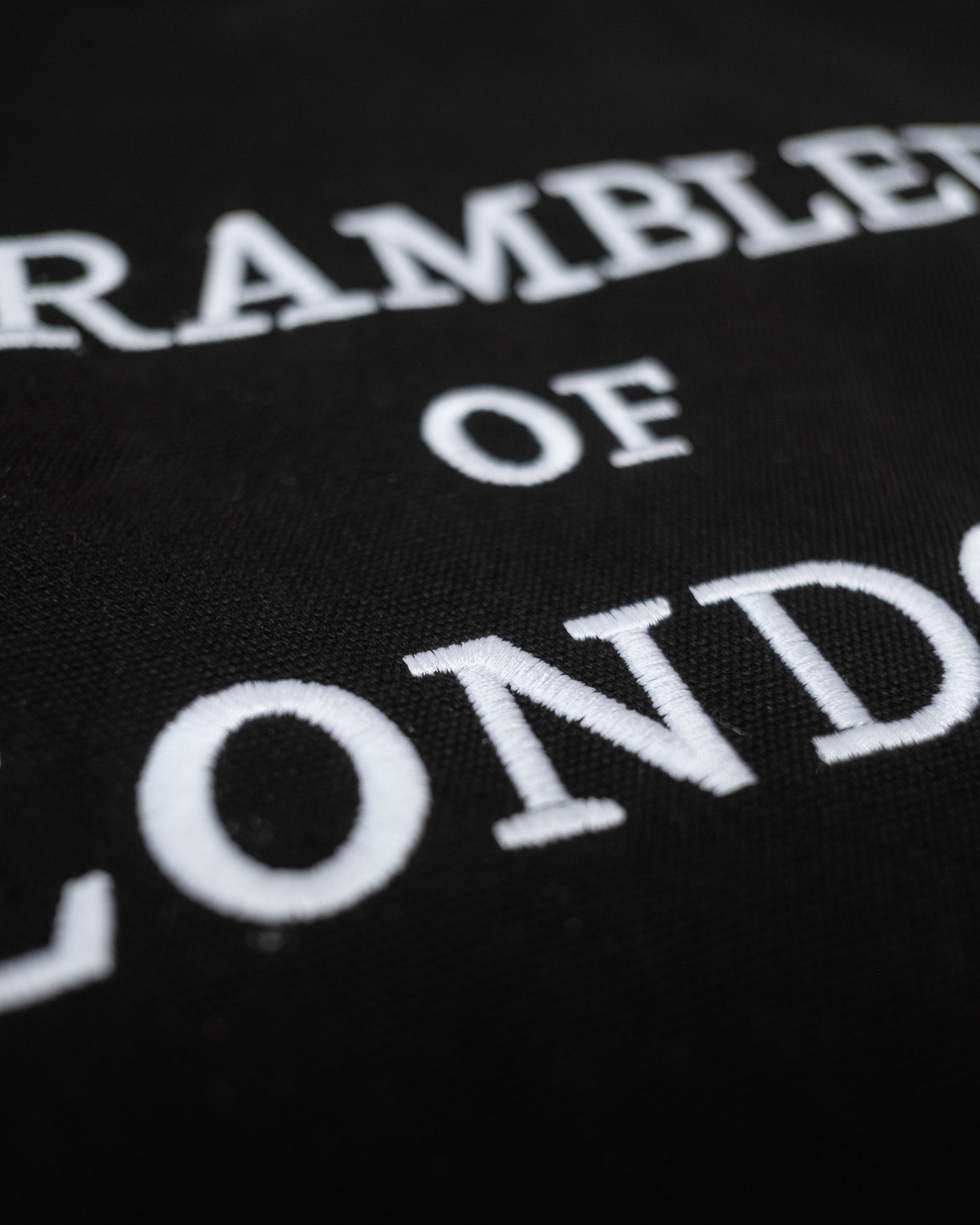 Close up of the Canvas Vest showing the embroidery